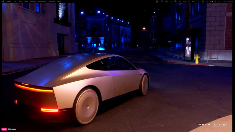 Musk Unveils Futuristic Two-Door Robotaxi with Gull-Wing Doors, No Steering Wheel